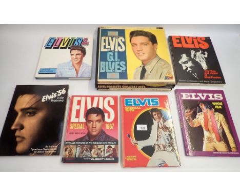 A group of Elvis records, annuals and books