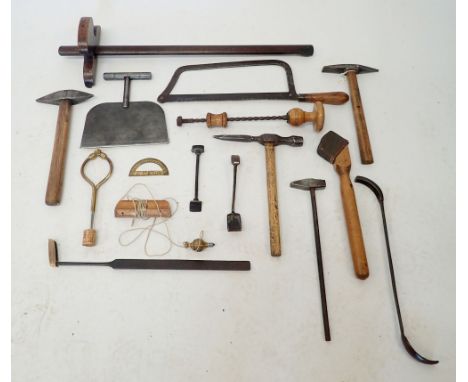 A group of Victorian tools including Archimedes drill, mould stones etc.