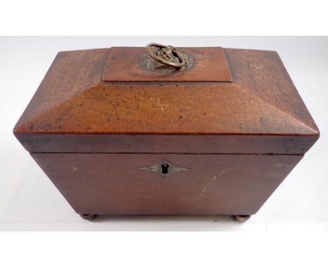 A 19th century mahogany tea caddy with stamped brass handle to lid, 19cm wide