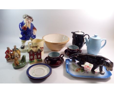 A group of pottery including Toby jug, Wade pipe stand, Denby T Green mixing bowl etc.