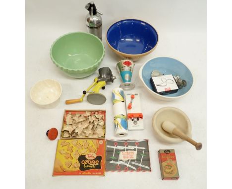 A box of vintage kitchenalia including Greens mixing bowl, Tala cookie cutters etc.