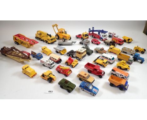 A group of die cast trucks and commercial vehicles etc. including Matchbox, Britains, Corgi, Matchbox Command vehicle NASA, C