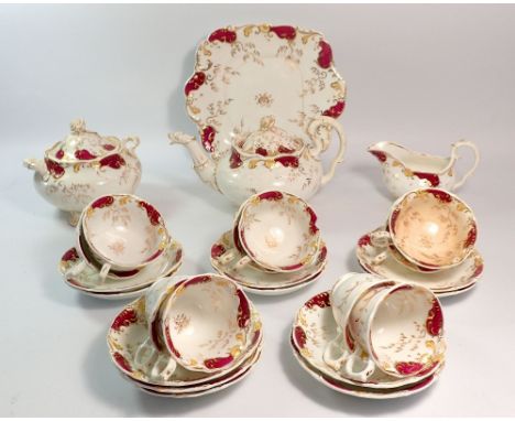 A Victorian Rockingham style tea service in puce and gilt comprising teapot, covered sugar, milk, six tea cups and four coffe