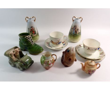A pair of Edwardian vases printed women on a bridge, two nursery cups and saucers and other novelty china