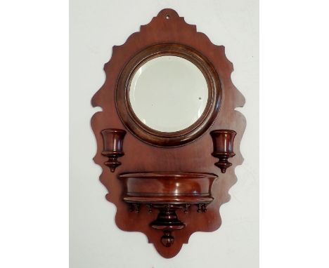 A Victorian mahogany hall mirror with turned decoration and demi lune shelf, 65cm tall