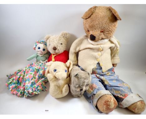 A group of vintage soft toys including teddy bear 