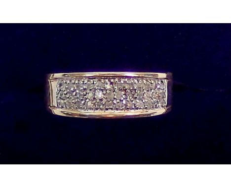 A 9 carat gold ring inset three rows of diamonds, size K to L, 3g