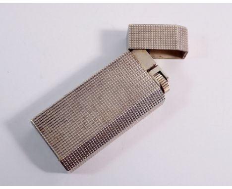 A Cartier silver plated cigarette lighter No 25879L 