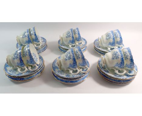 An Edwardian Cauldon blue floral tea service comprising twelve cups and saucers and twelve tea plates 