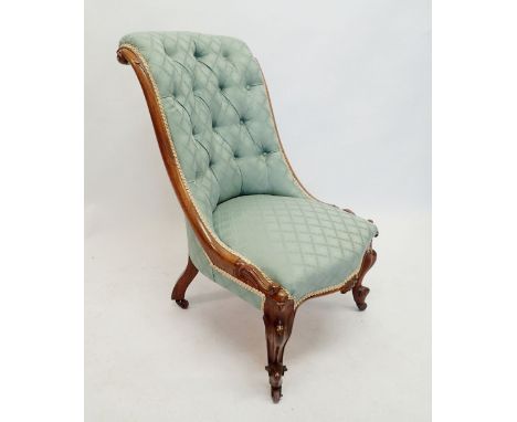 A Victorian scrollback armchair with scroll arms and cabriole supports - blue button upholstered