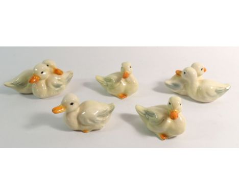 Three Goebel ducks/ducklings figures and two groups of two Goebel duck/ducklings, 5cm tall