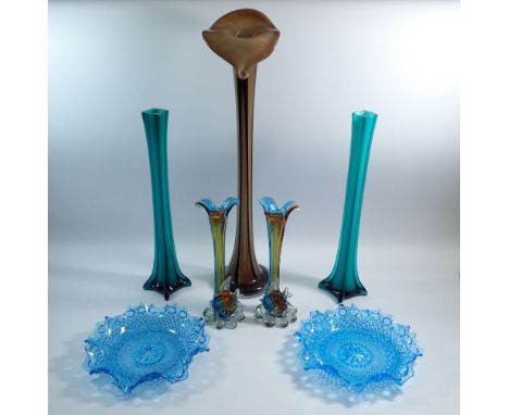 A collection of coloured vintage glass including tall brown vase, pair of green tall vases, blue dishes, two fish vases etc. 
