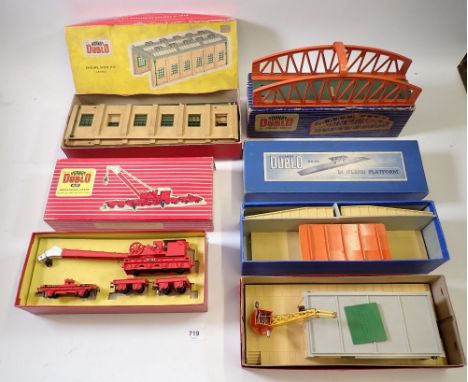 Five Hornby Dublo accessories 32141 D1 Girder Bridge, 5005 Engine Shed kit (2-Road), 5020 Good Depot, 4620 Breakdown Crane an