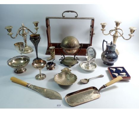 A box of various silver plated items including tantalus, candelabra etc.