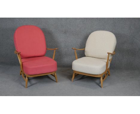 A pair of vintage light beech framed Ercol style easy armchairs. 