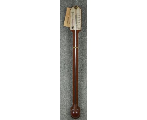 A 19th century stick barometer with silvered scale plate and mahogany case with bulbous cistern cover to the base. H.95cm 