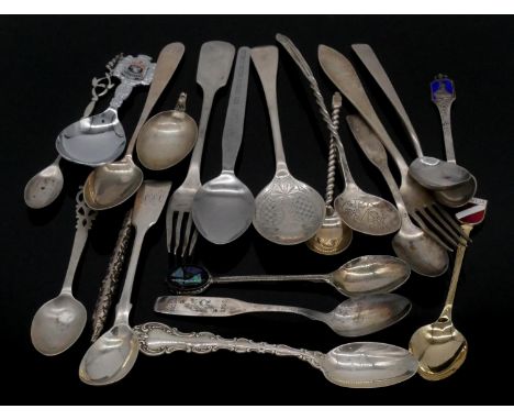 A collection of silver and silver plate cutlery. Including two Russian silver cake forks, a Chinese engraved condiment spoon,