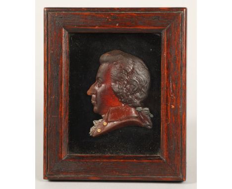 18th Century framed wax miniature portrait of Mozart on glass, inscribed verso, 12cm x 9cm including mount.