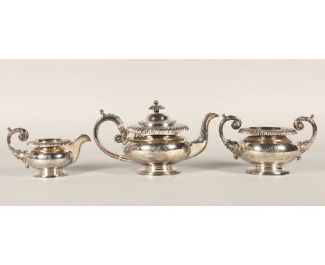 George III silver three piece tea service, consisting of teapot, sugar and cream, assay marked Sheffield 1819, John Watson, 1
