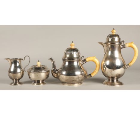 Four piece silver tea service comprising of teapot coffee pot, sugar basin and cream jug with ivory handles and finials, assa