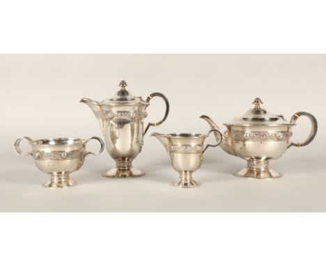 Four piece silver tea service, consisting of teapot, coffee pot, sugar bowl and cream jug, decorated with a Celtic border, as