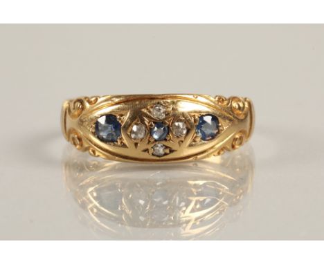Ladies 18ct yellow gold diamond and sapphire ring, ring size O/P.