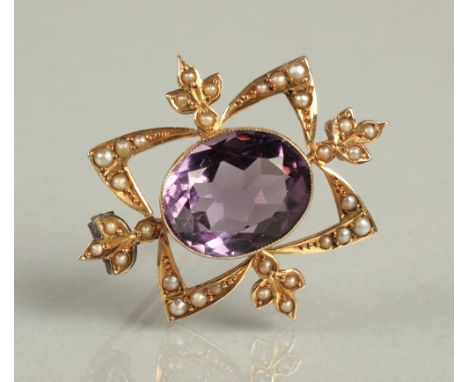Ladies 9ct yellow gold amethyst and seed pearl brooch. 