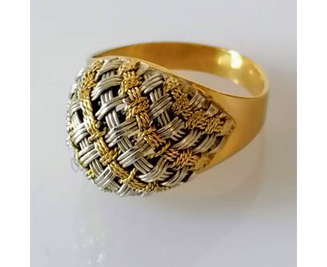 A white and yellow gold dress ring with woven pattern, size O, stamped 750, 5.64g