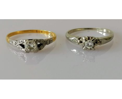 An early 20th century yellow gold and platinum diamond solitaire ring, round-cut diamond approximately 0.02 carats in a rub o