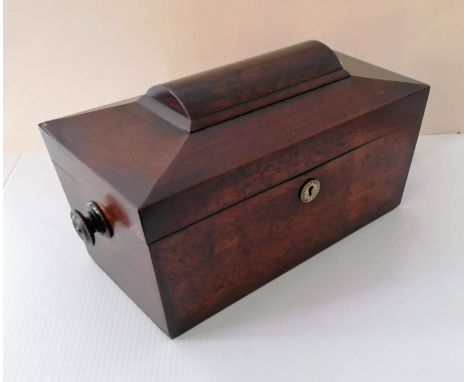 A Georgian rosewood sarcophagus-shape tea caddy with side handles and fitted interior, 18.5 x 31 x 16 cm