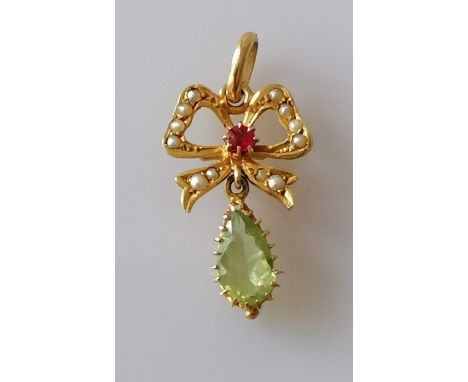 A Victorian gold ribbon pendant with seed pearl, garnet and peridot decoration, 36mm x 15mm, hallmarked 18ct, 1.94g