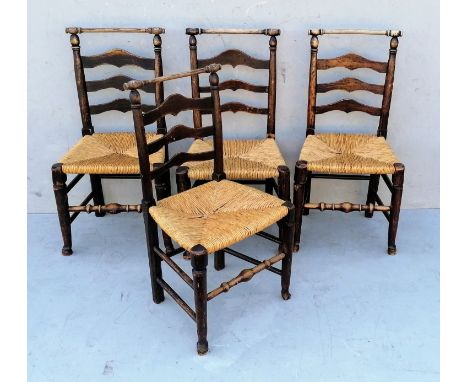 A harlequin set of four early 19th century ash and elm Macclesfield dining chairs with ladder backs, rush seats, on turned le