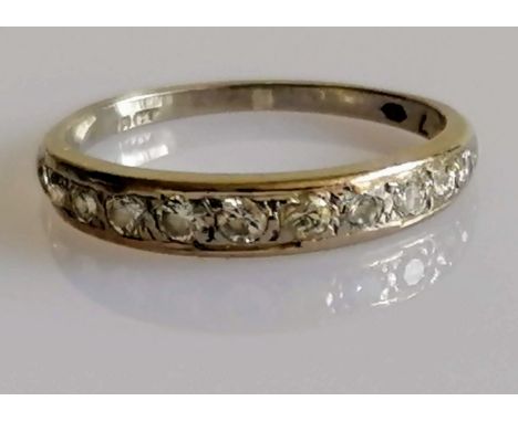 A white gold and diamond half-hoop eternity ring, size O, 2.63g