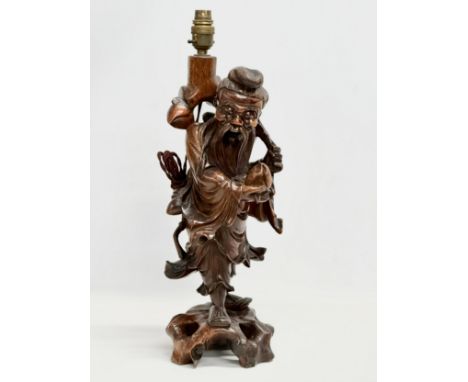 A large early 20th century Chinese carved boxwood table lamp. 52cm 