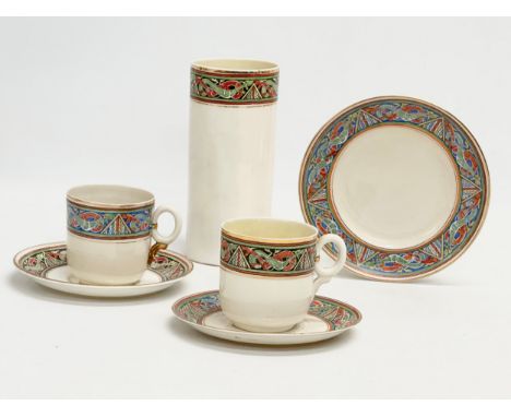 A rare 3rd period Belleek pottery ringed ‘Celtic Design’ part coffee service. Including a 2nd period Belleek coffee can. Circ