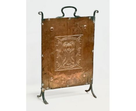 An early 20th century Arts &amp; Crafts copper and iron firescreen. Circa 1900-1910. 40x16x65cm 