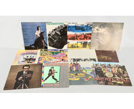 A good collection of LP, Vinyl records. The Beatles White Album, The Police Synchronicity, The Beatles Magical Mystery Tour, 