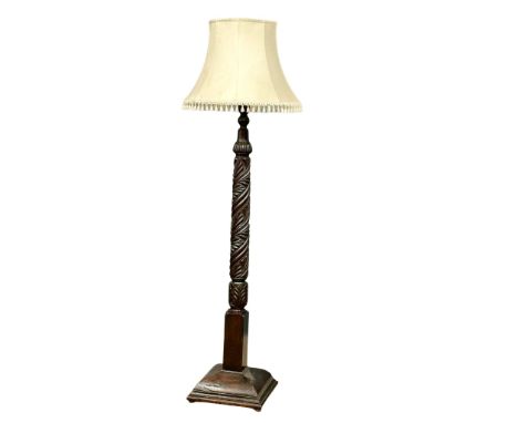 A large good quality early 20th century carved standard lamp. 188cm(5) 