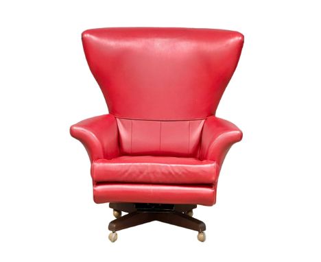 A G-Plan ‘Blofeld’ Mid Century leather swivel chair on teak base. Model 6250.(2) 