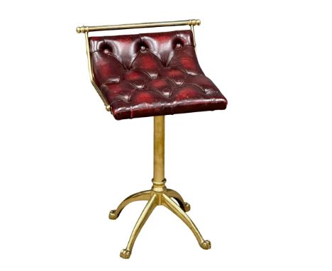 A Jans of London brass revolving harpists stool with deep button ox-blood leather seat. 39x39x60cm 