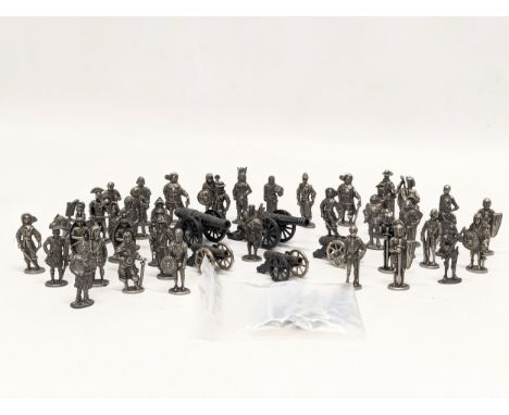 A collection of metal model figures 