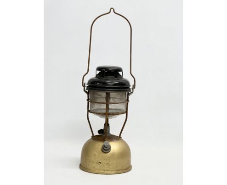 A vintage Tilley lamp. 