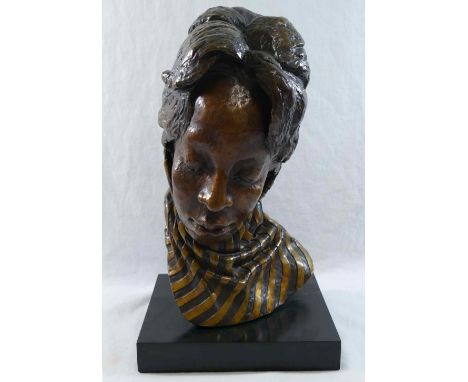 A head study of an African lady wearing a scarf, bronze with gilt detail, on rectangular plinth, initialled, dated 1975 and n