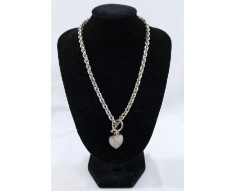 A selection of jewellery items marked 'silver', '925' and 'sterling', comprised of a heavy chain with heart pendant and ring 