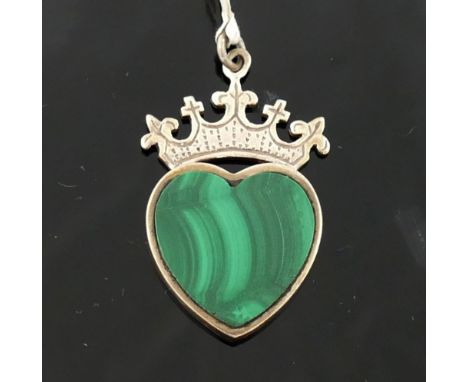 A silver and malachite pendant in the form of a heart beneath a crown, two malachite pendants, a pair of malachite drop panel