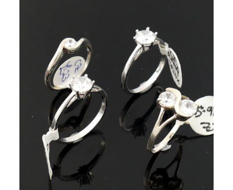 A selection of cubic zirconia set jewellery stamped '925', 'sterling' and 'silver', comprised of four rings and 11 pendants.W