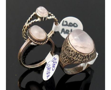 A quantity of rose quartz jewellery, comprised of three rings, a brooch, two pendants, two pairs of drop earrings, a pair of 