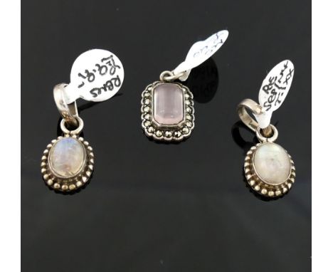 A selection of moonstone jewellery comprised of a cylindrical bead necklace with a matching pair of drop earrings, two bracel