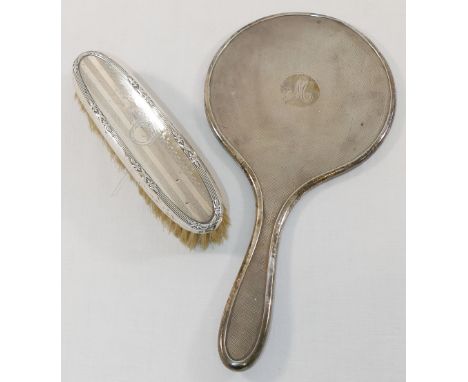 An ornate gilt spoon stamped 'sterling' by J Ritter, a small silver butter knife, a silver napkin ring, a small Egyptian silv