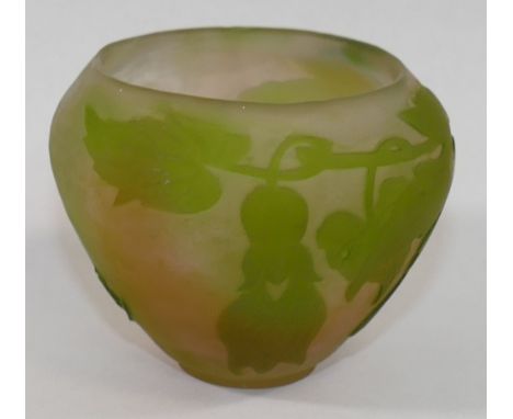 A small cameo glass bowl in the style of Galle decorated in relief with trailing flowers to a cream and peach ground, with ra